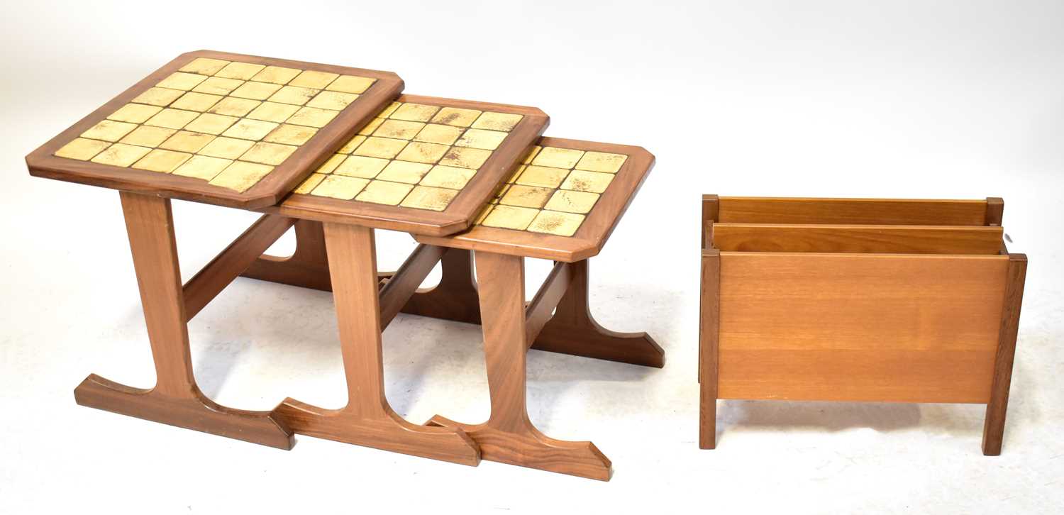 Lot 33 - A mid-20th century teak nest of tables with...