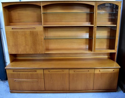 Lot 14 - MEREDEW; a teak dresser, the top with cocktail...