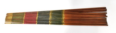 Lot 765 - Eleven painted wooden pool cues, length 130cm...