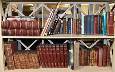 Lot 330 - A collection of mixed books including leather...