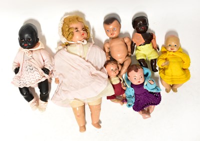 Lot 326 - Seven dolls of varying ages and sizes, plastic...