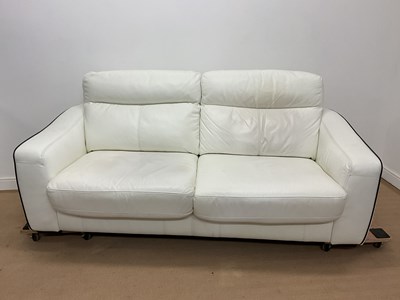 Lot 813 - A modern white leather large two seater sofa...