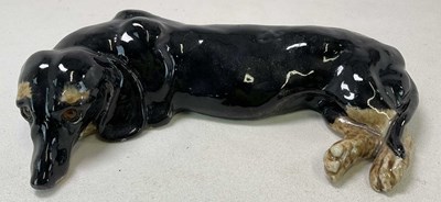 Lot 192 - WINSTANLEY; a dachshund in a recumbent...