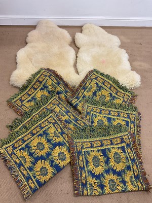 Lot 700 - A pair of sheepskin rugs and six Jacquard rugs...