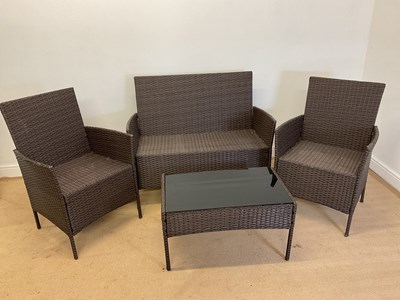 Lot 748 - A modern garden furniture suite, comprising...