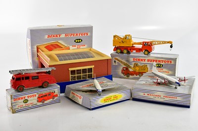 Lot 911 - DINKY SUPERTOYS; four boxed diecast models...