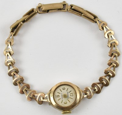 Lot 1032 - MAJOREX; a lady's 9ct yellow gold wristwatch,...