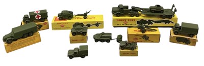 Lot 551 - DINKY TOYS; nine boxed model tanks and...