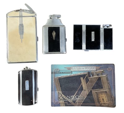 Lot 384 - RONSON; a 1930s Art Deco chrome and black...