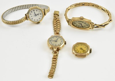 Lot 1014 - Four 9ct yellow gold lady's watch heads, three...