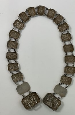 Lot 443 - WANG HING; a Chinese silver belt made of...