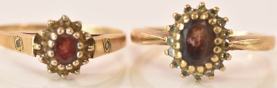 Lot 619 - Two 9ct yellow gold flower head designed rings,...