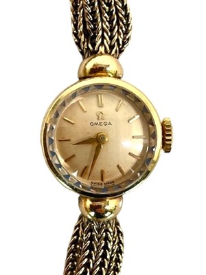 Lot 650 - OMEGA; a lady's vintage 9ct yellow gold...