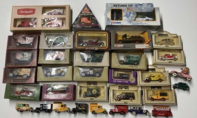 Lot 130 - A small collection of model vehicles,...