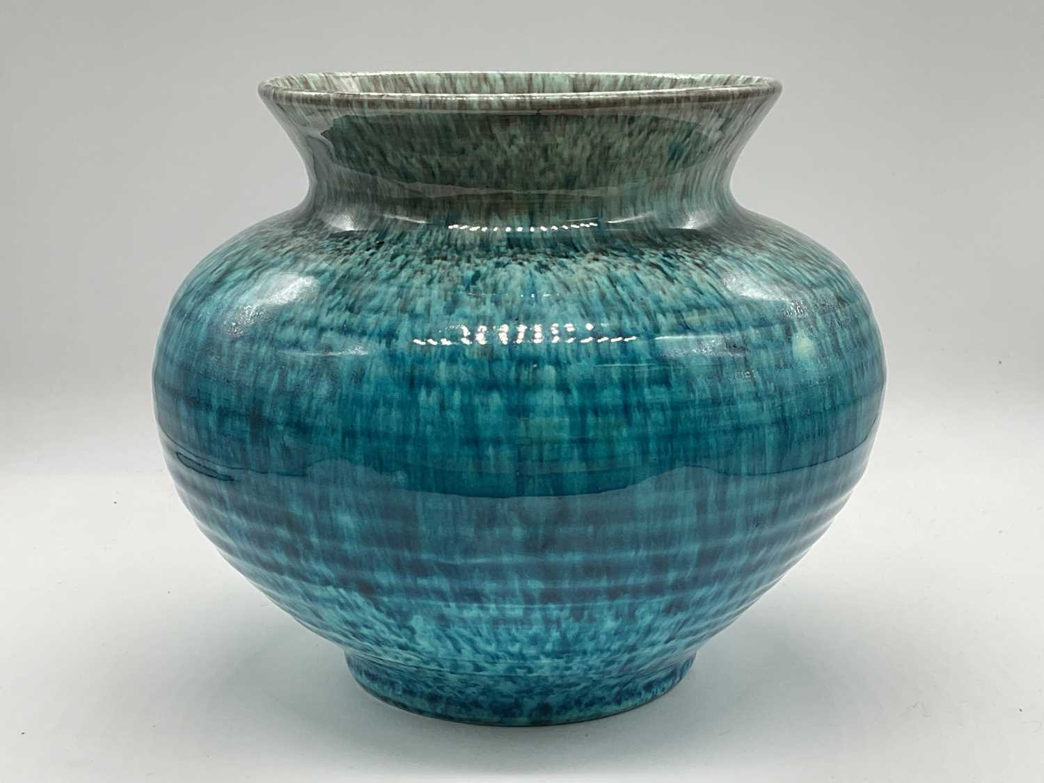 Lot 194 - ACCOLAY; a pottery vase of ribbed form and...