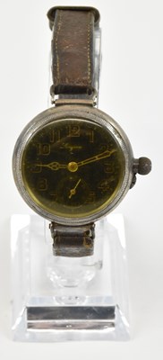 Lot 1015 - LONGINES; a WWII trench watch, the black...