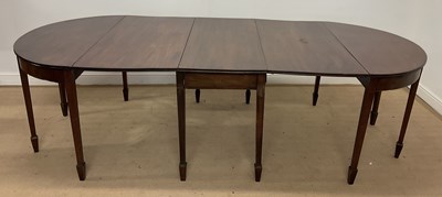 Lot 771 - A mahogany D-end extending dining table with...