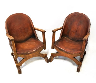 Lot 44 - A pair of 1930s oak-framed leather-studded...