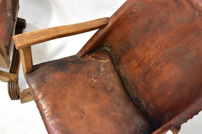 Lot 44 - A pair of 1930s oak-framed leather-studded...