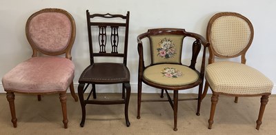 Lot 816 - A pair of satinwood camel back chairs, in...