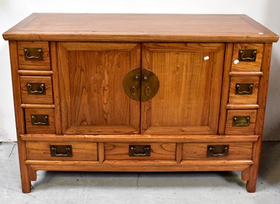 Lot 92 - A contemporary Oriental-style hardwood cabinet,...