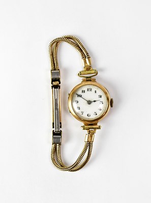 Lot 825 - A 9ct yellow gold cocktail watch, the white...