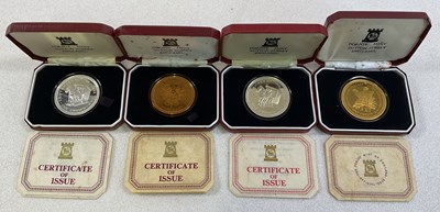 Lot 402 - POBJOY MINT; four encapsulated and boxed...