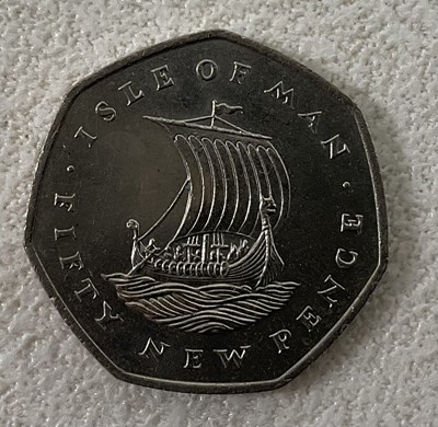 Lot 389 - ISLE OF MAN 1973; a rare fifty pence piece.