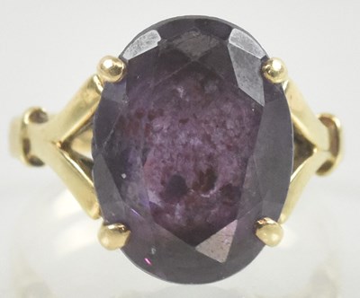 Lot 913 - A yellow metal amethyst set dress ring, the...