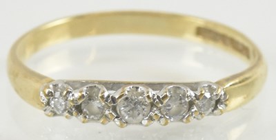 Lot 1259 - A 9ct five gold stone diamond set ring, size P,...