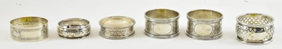 Lot 787 - A pair of hallmarked floral decorated napkin...