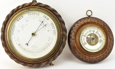 Lot 117 - Two wall mounted barometers, the largest in an...