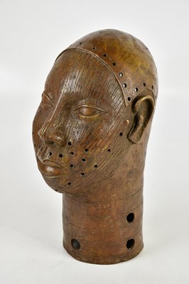 Lot 706 - An African bronze bust, height 37cm.