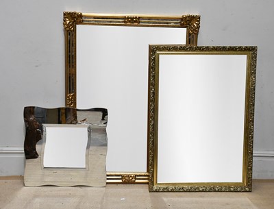 Lot 134 - A large gilt framed rectangular wall mirror,...