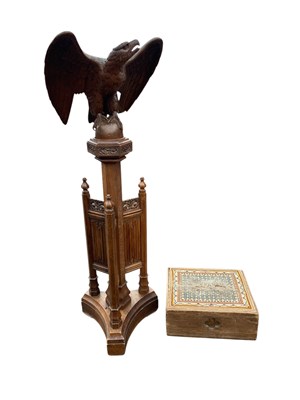 Lot 148 - A carved oak ecclesiastical lectern and step,...