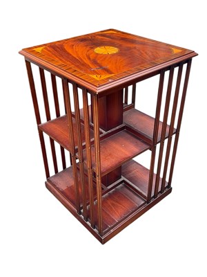 Lot 42 - A reproduction mahogany revolving bookcase,...