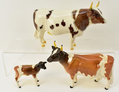 Lot 621 - BESWICK; a family group of three Ayrshire...