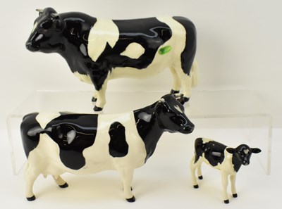 Lot 622 - BESWICK; a family of Friesian cattle...