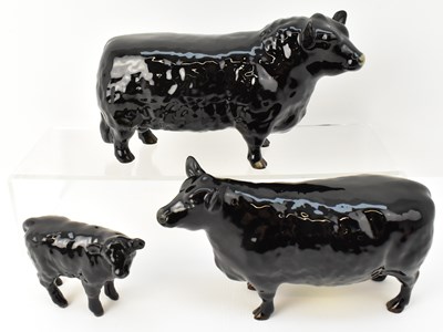 Lot 624 - BESWICK; a family of three Aberdeen Angus...