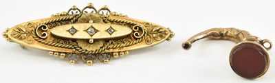 Lot 868 - A Victorian 15ct gold brooch of oval shape,...