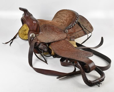 Lot 1199 - EASY RIDER; an embossed leather saddle and...