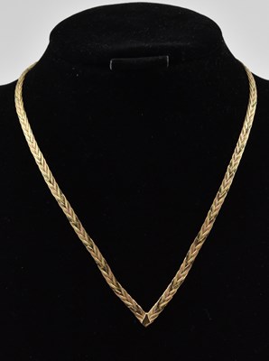 Lot 850 - A 9ct gold flat link herringbone style...