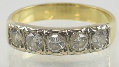 Lot 805 - An 18ct gold five stone diamond set ring, each...