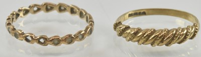 Lot 962 - Two 9ct gold rings, one with cut shank, size Q,...