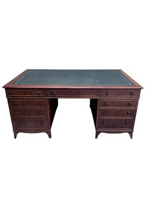 Lot 69 - A reproduction pedestal desk, with an...