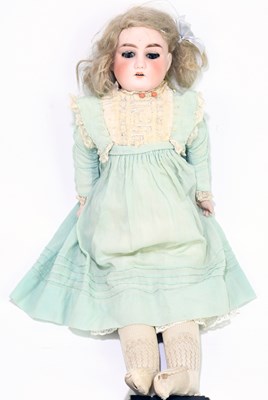 Lot 180 - A 20th century German bisque headed doll, in...