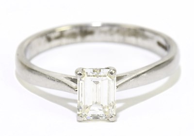 Lot 1018 - A platinum and diamond solitaire ring, the...