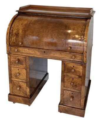 Lot 5 - A Victorian burr walnut roll top desk...