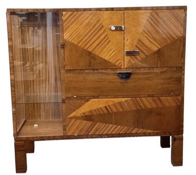 Lot 82 - A 1950s Art Deco style walnut wall unit, with...