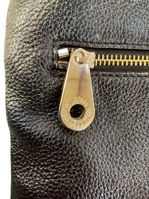 Lot 470 - IN THE STYLE OF MULBERRY; a black leather lady'...